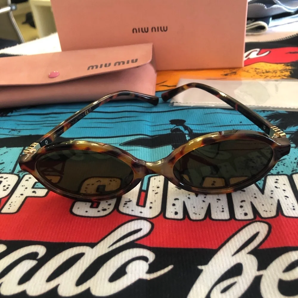 Miu Miu Tortoiseshell Oval Sunglasses - Brown Lenses